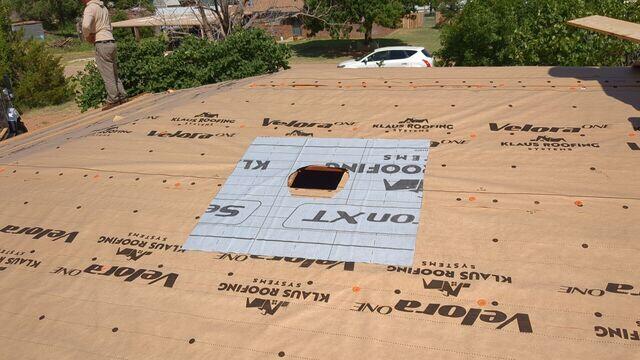 Adding Klaus Roofing Sealoron XT ice and water.