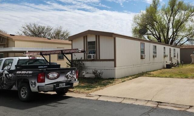 Fortenberry Roofing Crew inspecting the mobile home