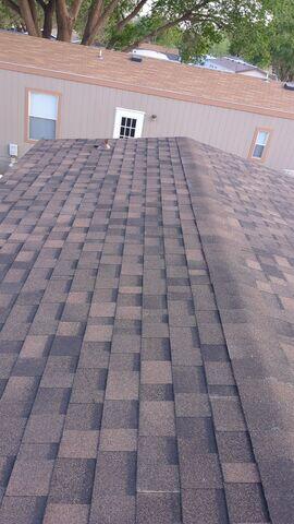 Finishing the roof with new improved Shingles.