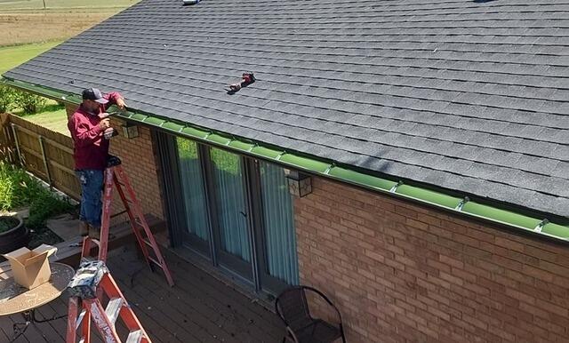 Rain Gutters being installed