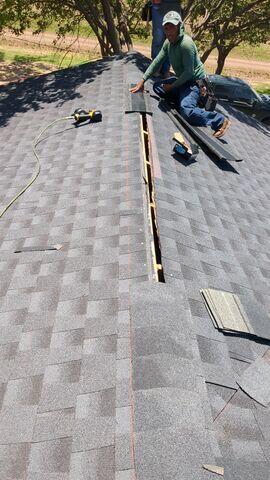 Ridge Vent being installed.