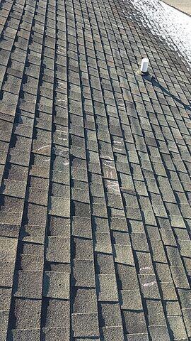 Sales man marking the hail damage.