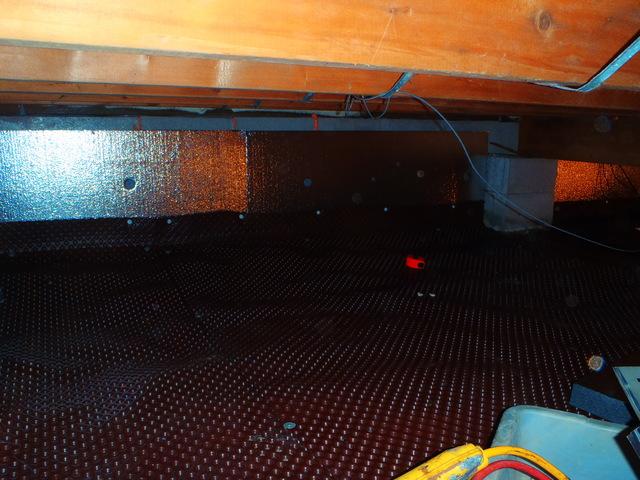 <p>Dr. Energy Saver Delmarva has installed drainage matting along the dirt floor of the crawl space. The drainage matting is dimpled to create air space for water to flow.&nbsp;</p>