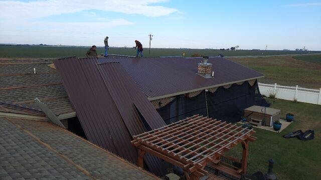 The process of removing the metal roof.