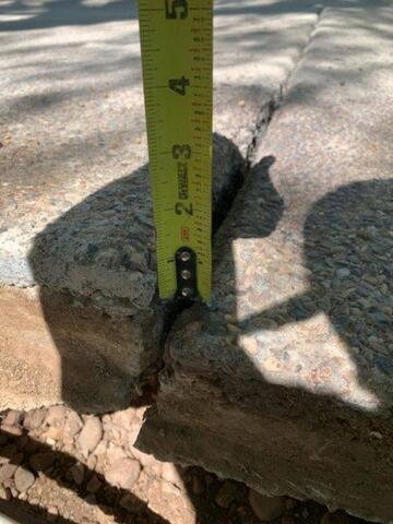 Signs of Foundation Settlement Problems: Uneven Concrete Slabs in Paradise Valley, Arizona