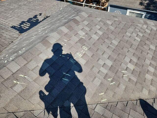 Fortenberry Roofing Sales man Hail Marking
