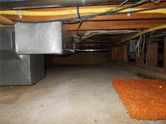 <p>No crawlspace is too low for Basement Systems.</p>