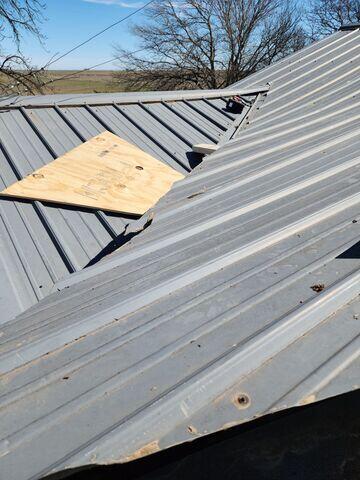 Fortenberry Roofing materials being placed on roof.