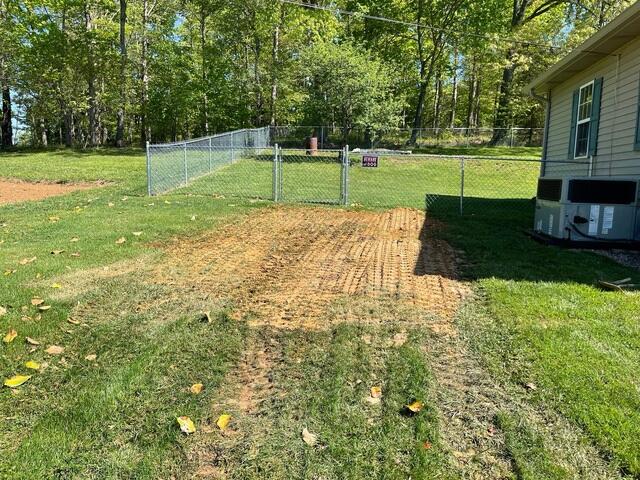 The backyard of the house after our crew was done installing the wall anchors.