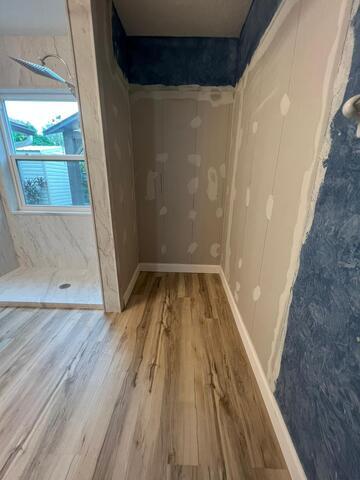 Shower turned storage, maximizing space utilization.