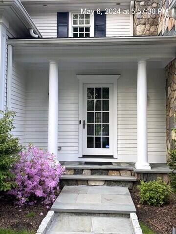 Side porch door, columns and walkway