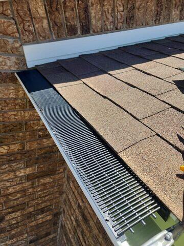 Adding the gutter guards.