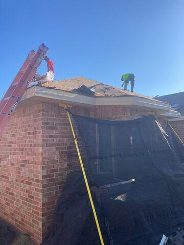 Fortenberry Roofing crew removing the shingles.