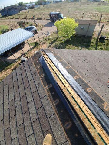 Exposing the decking of the ridge.