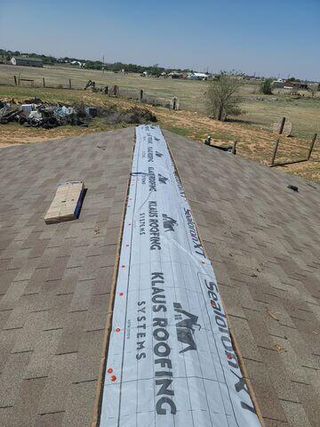 Placing the Klaus Roofing system Ice and Water.