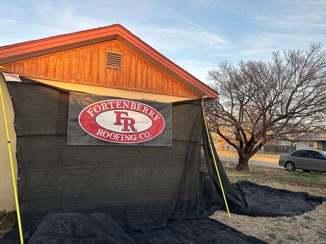 Fortenberry Roofing Catch all Tarp.
