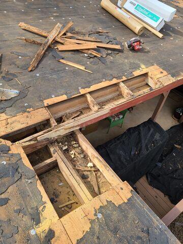 Removal of old decking.