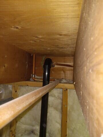 Discharge through the floor joist cavity