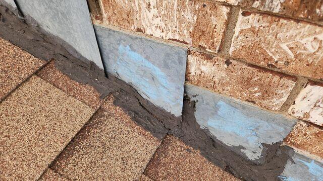 Old tar around the chimney.