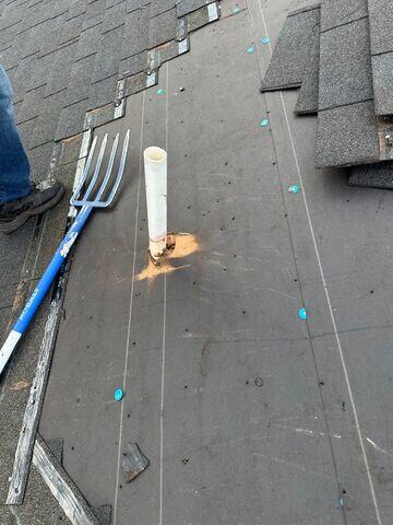 Fortenberry Roofing Crew removing the shingles.