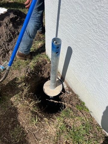 Helical Pier Drilled Into Soil