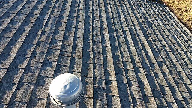 Salesman Robbie marking the hail hits.