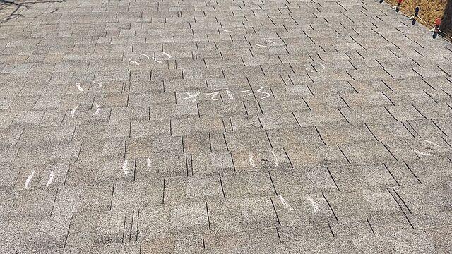 More hail damage on the other side of the house.