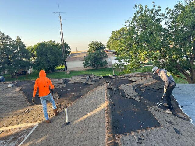 Bright and Early removal of the old Roof.