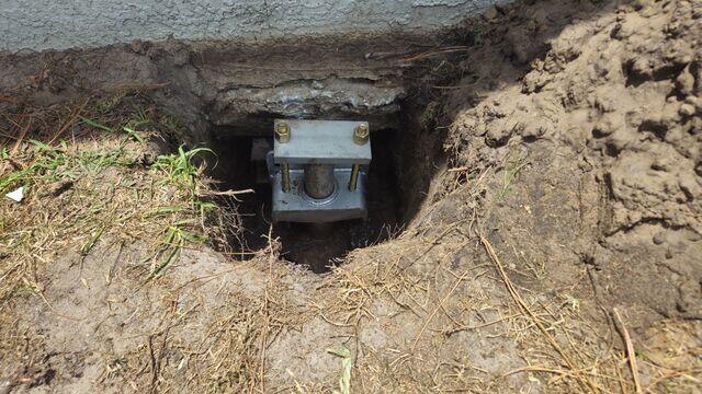 Complete Helical Pier Installation