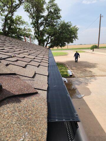 Adding the gutter guards around the main home and barn.