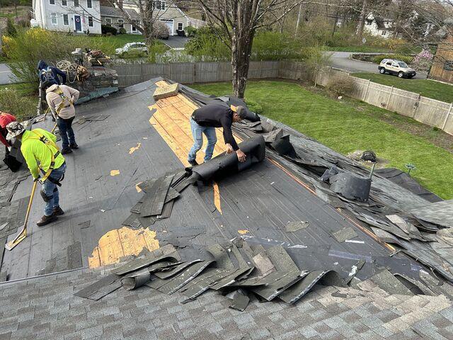 The Crew Removes the Old Shingles