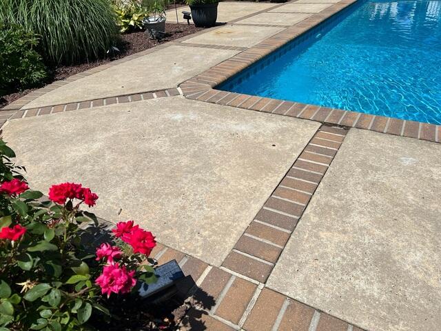 Look How Safe And Inviting This Poolside Patio Appears