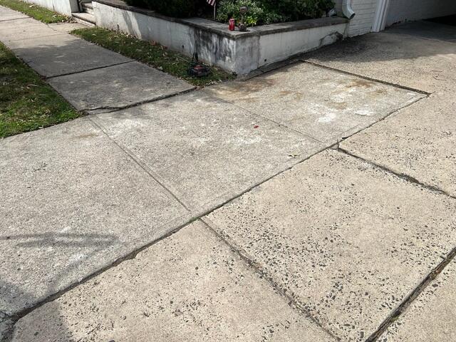 This Driveway Has Become Unsightly And Unsafe