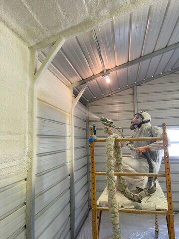 Crew Installing Spray Foam in a Metal Building