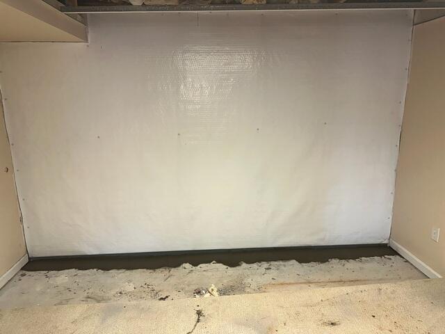 This is one of the basement walls already covered with our vapor barrier.