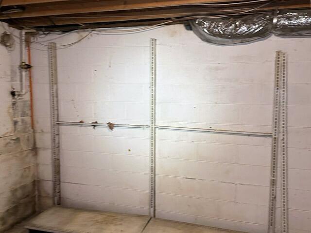 This is a picture of the wall before our crew worked on it.