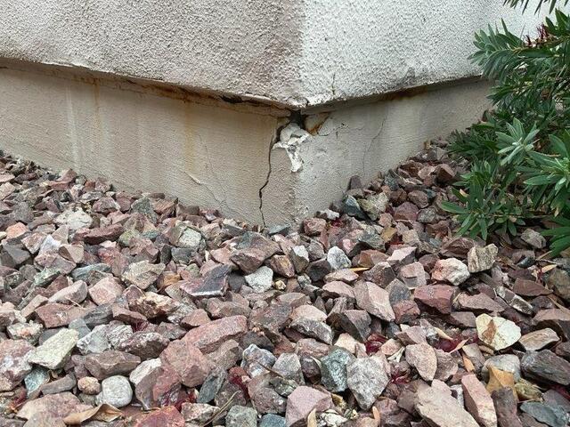 Symptoms of Corrosion in a Concrete Stem Wall: Spalling Concrete in Chandler, AZ