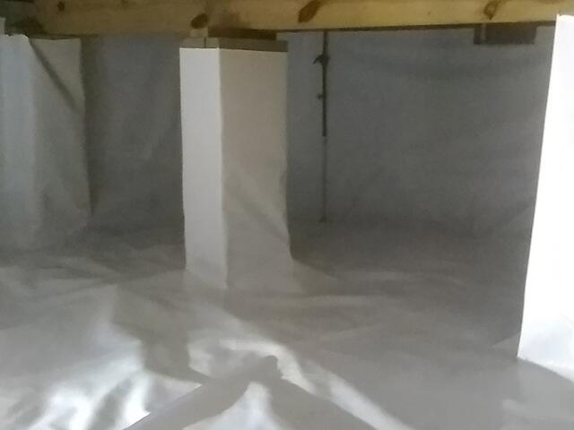 A beautiful view of the crawlspace fully encapsulated with our vapor barrier!