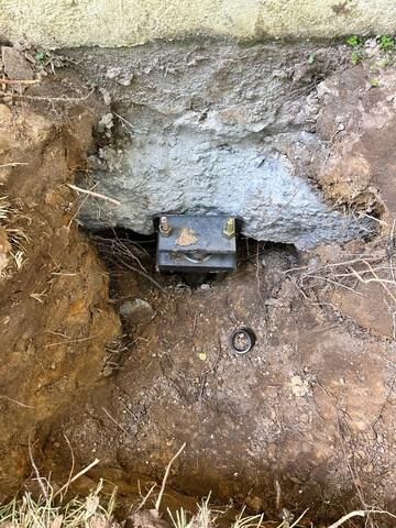 Helical Pier Attached to Footing