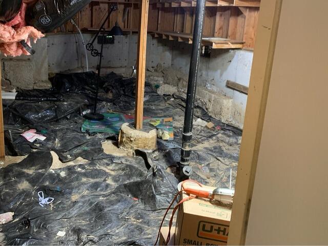 Old Vapor Barrier Damaged