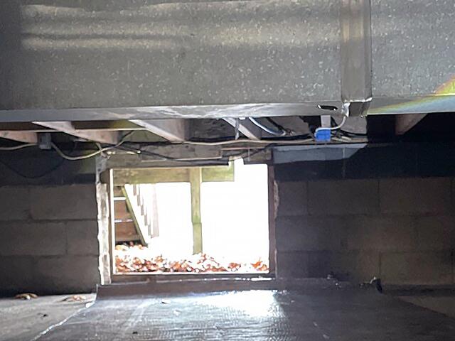 Uninsulated Crawl Space Entrance