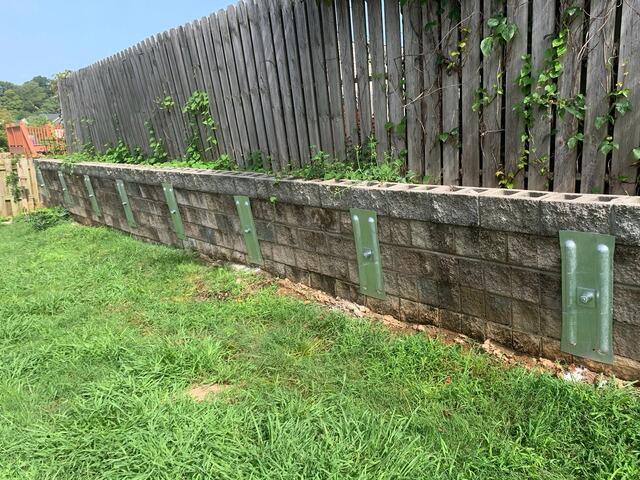 A view of the retaining wall once the anchor plates were installed.