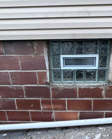 (3) Glass block window with air vents/ wave pattern.