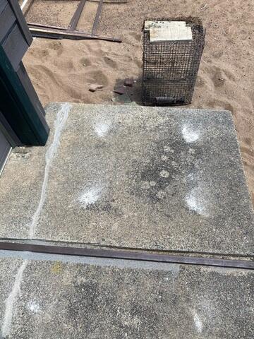 End of Sidewalk that is Lifted with the cracks Sealed Off
