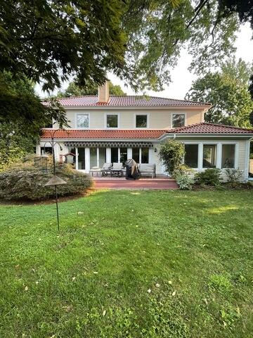 Rear of home with deck