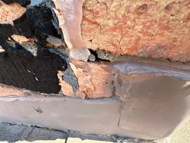 Damage to the mortar in the chimney.