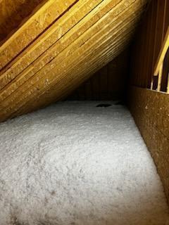 New Fiberglass Blown in Attic