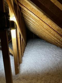 New Fiberglass Blown into Attic