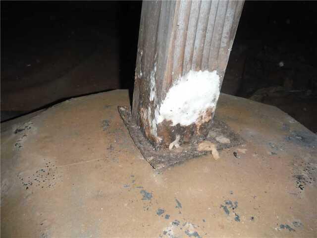 Water Damaged Wooden Post