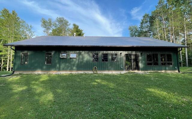 70' Piece of Gutter Shutter with the High Volume Hood in Musket Brown.